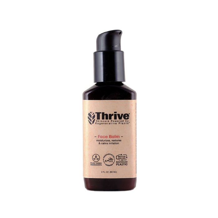 A bottle of Thrive Face Balm with a pump dispenser, labeled as moisturizing, restoring, and calming irritation, in a brown container with a tan label featuring eco-friendly and vegan symbols.