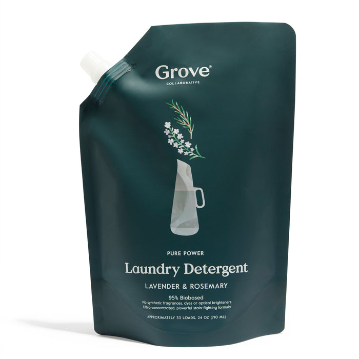 A dark green refill pouch of Grove Collaborative Pure Power Laundry Detergent in lavender and rosemary scent, featuring a simple illustration of flowers in a pitcher and white text detailing product information.