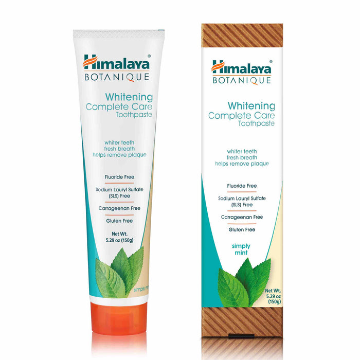 A tube and box of Himalaya Botanique Whitening Complete Care Toothpaste, highlighting features such as fluoride free, sodium lauryl sulfate free, carrageenan free, gluten free, and net weight of 5.29 oz (150g).