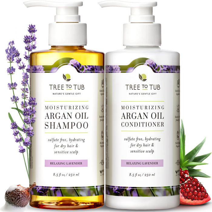 Two bottles of Tree to Tub Moisturizing Argan Oil Shampoo and Conditioner with pumps, surrounded by lavender sprigs, aloe vera, and argan nuts. Labels highlight they are sulfate free and for sensitive scalp.