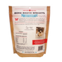 Back of a Brutus Bone Broth Biscuits bag, beef flavor, for dogs. The packaging includes product information, nutrition facts, feeding instructions, a photo of a dog, and a story about the brand’s mission.