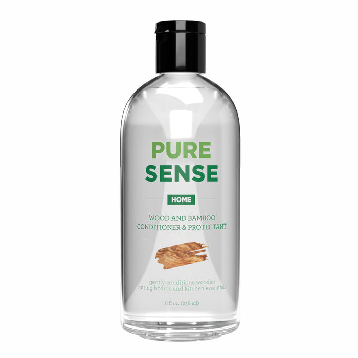 A clear bottle labeled PURE SENSE HOME Wood and Bamboo Conditioner & Protectant, featuring an image of wooden cutting boards. The bottle contains 8 fl oz (236 ml) and states it gently conditions wooden kitchen essentials.