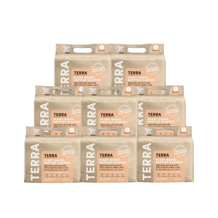 Eight packs of Terras Diapers - One Month Supply are stacked, featuring breathable dryness in beige packaging accented with orange. The eco-friendly and hypoallergenic labels stand out, while each pack includes 3D leak guards for protection and a convenient carrying handle.
