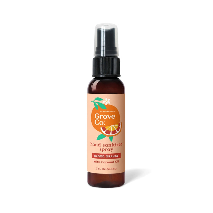 Grove Co. Hand Sanitizer Spray, Blood Orange scent, 2 fl oz, features an orange label with citrus graphics. Kills 99.9% of germs, non-drying with coconut oil, and includes a convenient pump top.
