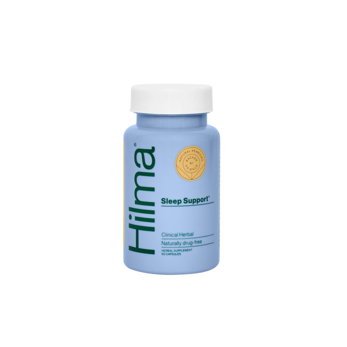 A blue bottle of Hilma Sleep Support supplements with a white cap and green branding, featuring a gold seal and text stating Clinical Herbal, Naturally drug-free, 30 capsules. The bottle is centered on a white background.