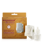 Mrs. Meyer's Premium Scented Oil Diffuser Kit includes a white plug-in diffuser, a clear scented oil refill, and comes in a brown and orange box featuring apple illustrations.