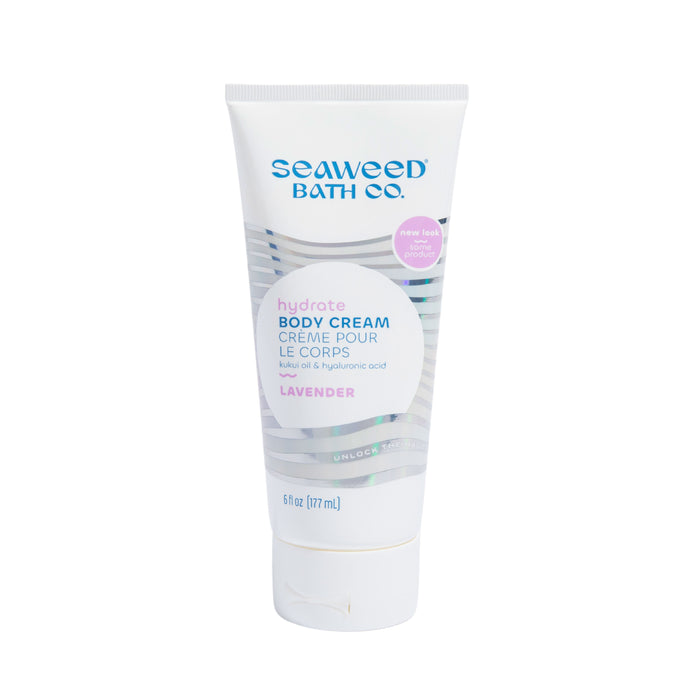 A tube of Seaweed Bath Co. Hydrate Body Cream in lavender scent, 6 fl oz (177 mL), with kukui oil and hyaluronic acid, featuring a white and purple label.