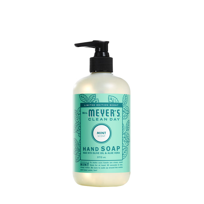 Mrs. Meyers Hand Soap, with a garden-inspired mint scent and black pump, features a light green label adorned with leaves. Infused with essential oils, olive oil, and aloe vera, it holds 370 mL of freshness perfect for your home.