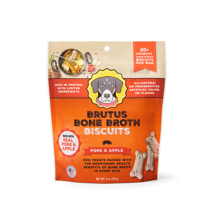 A bag of Brutus Bone Broth Biscuits in pork & apple flavor, featuring images of dog biscuits, a dog illustration, and product highlights such as high protein, limited ingredients, and all-natural with no preservatives.