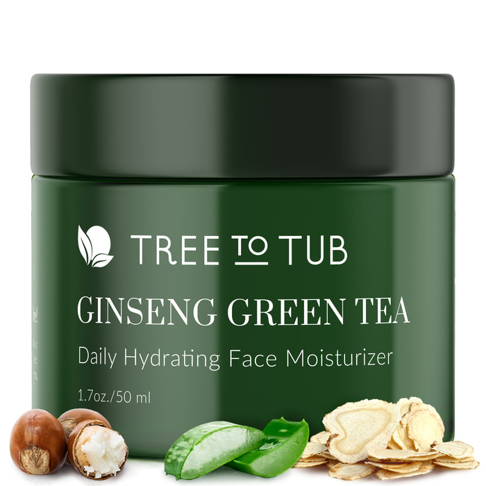 A green jar labeled Tree to Tub Ginseng Green Tea Daily Hydrating Face Moisturizer, 1.7 oz / 50 ml is shown with macadamia nuts, oats, and an aloe vera leaf in front.