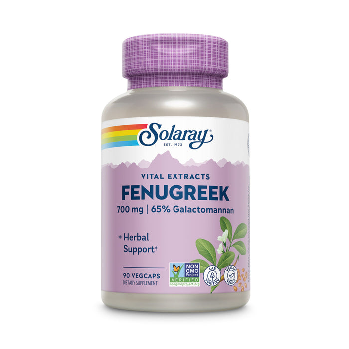 A bottle of Solaray Fenugreek dietary supplement with a lavender label, showing 700 mg strength, 65% galactomannan, 90 veggie capsules, and icons for non-GMO, vegan, and herbal support.