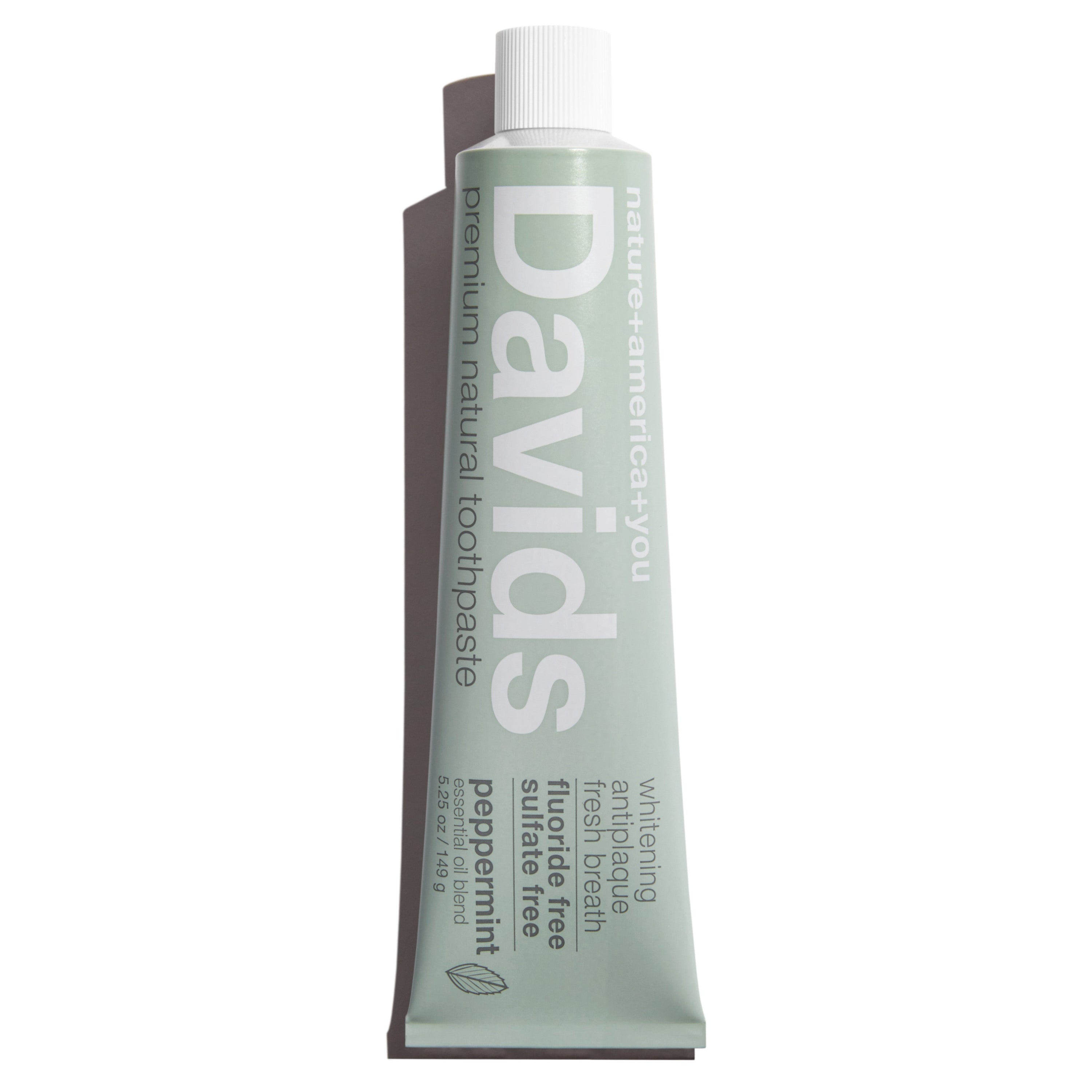 Davids Natural Toothpaste is a fluoride-free peppermint toothpaste with a natural formula. Its light green packaging with white text highlights benefits like whitening, anti-plaque, fresh breath, and sulfate free.