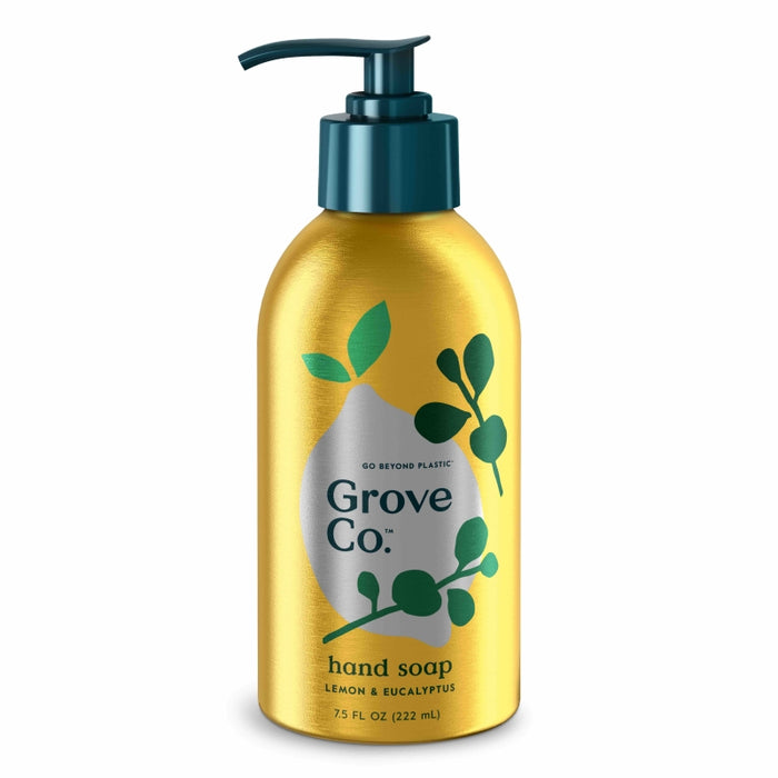 A yellow and green pump bottle of Grove Co. hand soap with lemon and eucalyptus, featuring leaf illustrations and labeled Go Beyond Plastic. The bottle contains 7.5 fl oz (222 mL).