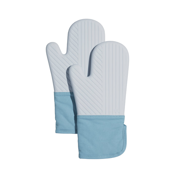 A pair of light gray silicone oven mitts with textured surfaces and light blue fabric cuffs, placed overlapping on a white background.
