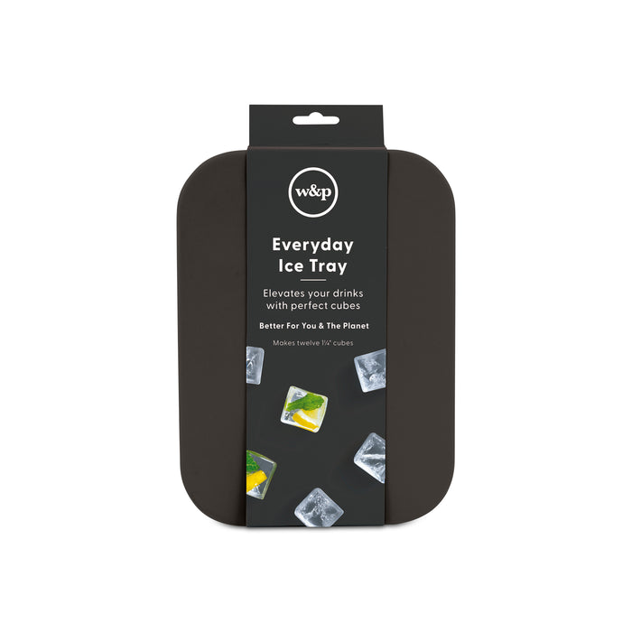 A black rectangular W&P Freezer Cubes tray in packaging. The label shows lemon and mint cubes, makes twelve 1 cubes, perfect for elevating drinks. Stack & Store for sustainable storage. Includes a free gift.