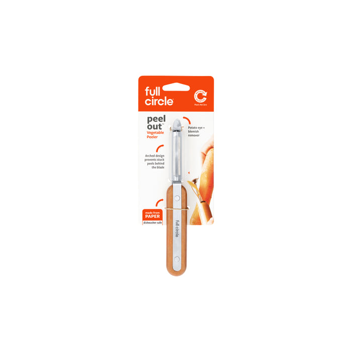 A Full Circle brand vegetable peeler in its packaging, featuring a wooden handle and silver blade. The packaging is mostly white with an orange section at the top displaying the product name and brief usage details.