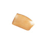 A smooth, rectangular swatch of shimmery, light brown liquid makeup or foundation is smeared on a white background.