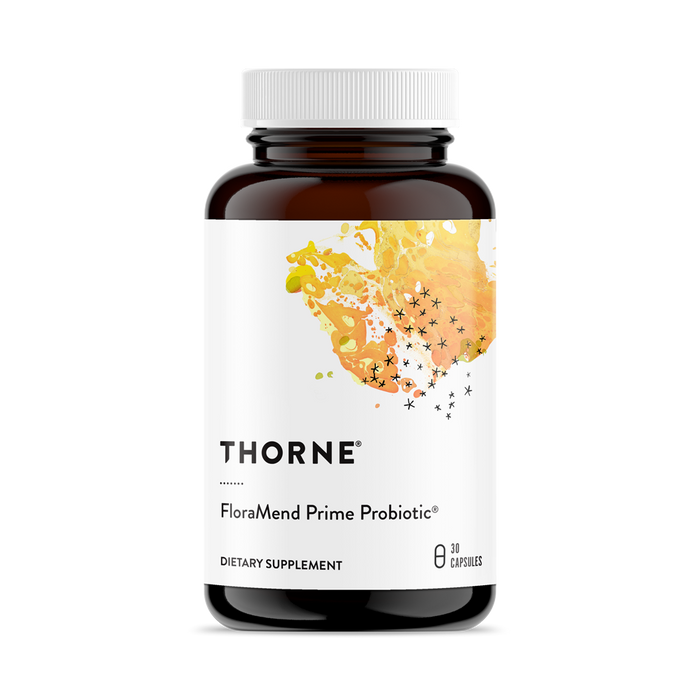 A brown bottle of Thorne FloraMend Prime Probiotic dietary supplement with a white label, colorful abstract design, and text indicating it contains 30 capsules.
