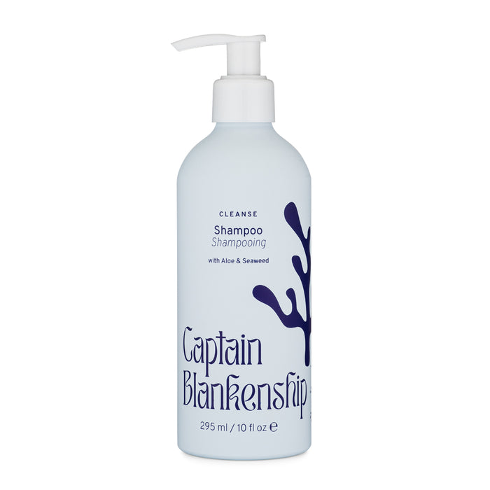 A light blue bottle of Captain Blankenship shampoo with a white pump, featuring dark blue seaweed graphics and text indicating it contains aloe and seaweed, 295 ml (10 fl oz).