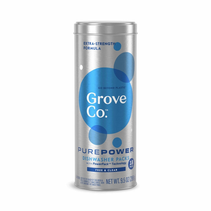A silver cylindrical container of Grove Co. Pure Power Dishwasher Packs with blue bubble designs, displaying Extra-Strength Formula and Free & Clear, 18 packs on the front.