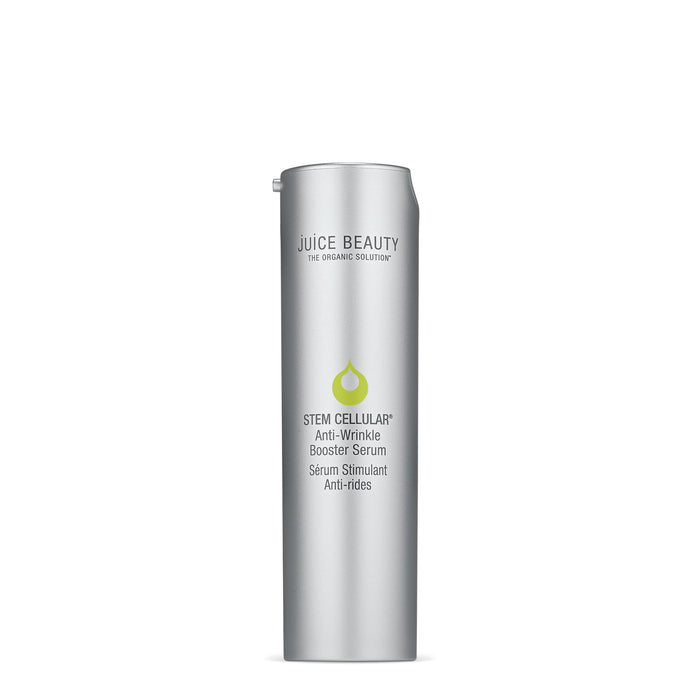 A sleek silver bottle of Stem Cellular Anti-Wrinkle Booster Serum from Juice Beauty features a green droplet logo, highlighting its potent anti-wrinkle properties.