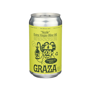 A bright yellow can labeled Graza features a cartoon chef holding an olive oil bottle, promoting Sizzle Extra Virgin Olive Oil - Refill. Its highlighted as recyclable and ideal for eco-conscious chefs.