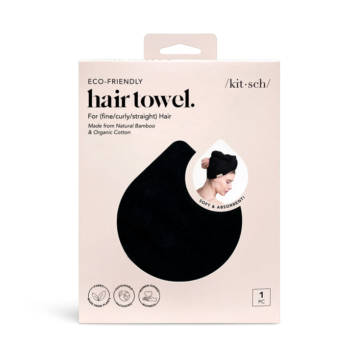 Beige box of Kitsch eco-friendly hair towel for all hair types. The packaging shows a black hair towel, icons for bamboo and cotton, and a photo of a woman wearing the towel. Text highlights softness and absorbency.