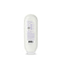 A white bottle of hair care product shown from the back, displaying text, ingredients, and a barcode in purple and black on the label. The bottle has a rounded top and a flat, white flip-top cap.