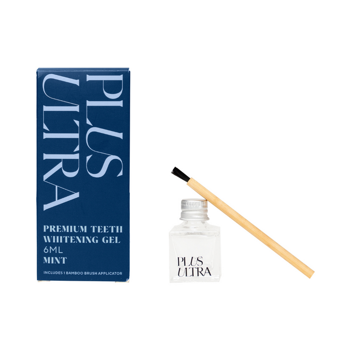 A blue box labeled PLUS ULTRA Premium Teeth Whitening Gel 6ML Mint stands next to a small clear bottle and a bamboo brush applicator.