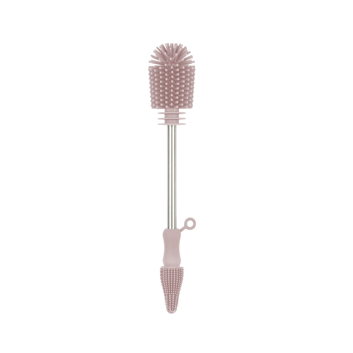 A silicone bottle cleaning brush with a long handle, featuring a spiky round brush head on one end and a textured, pointed tip on the other end, both in light pink.