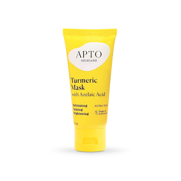 A yellow tube of APTO Skincare Turmeric Mask with Azelaic Acid, labeled as exfoliating, calming, and brightening for all skin types. The tube is upright against a white background.